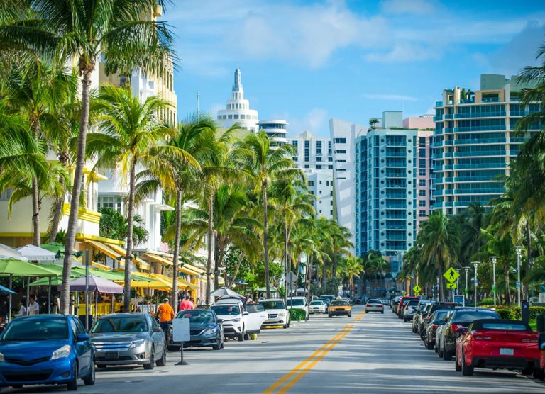 Bright scenic view of Ocean Drive in South Beach, Miami on a lig